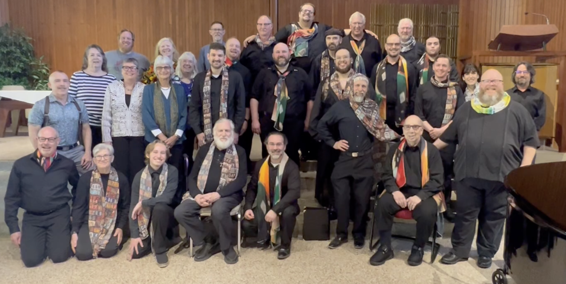 A group photo of the performers and off-stage members during the 2026 spring concert.